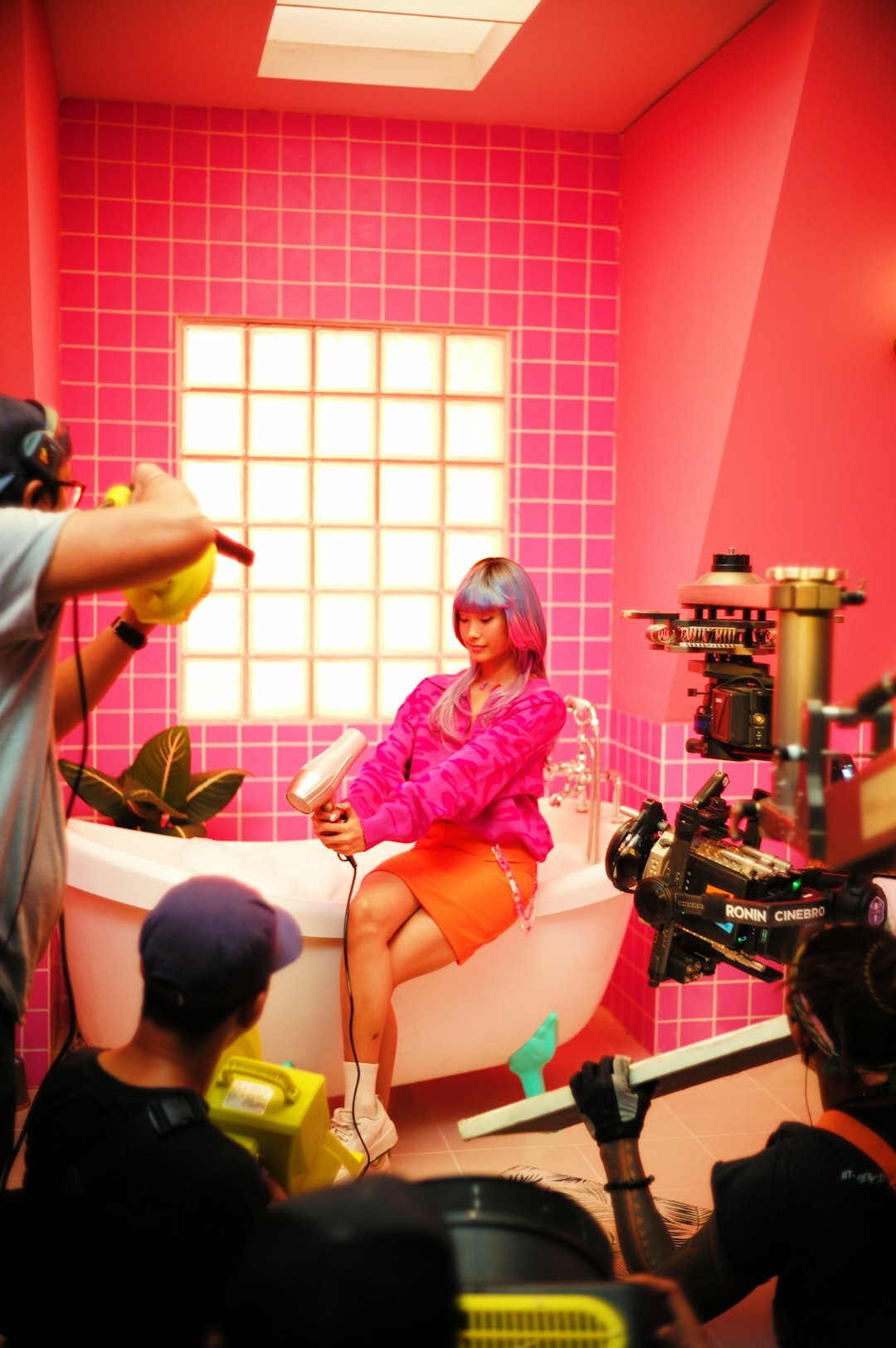 Television host in an elegant interview studio set