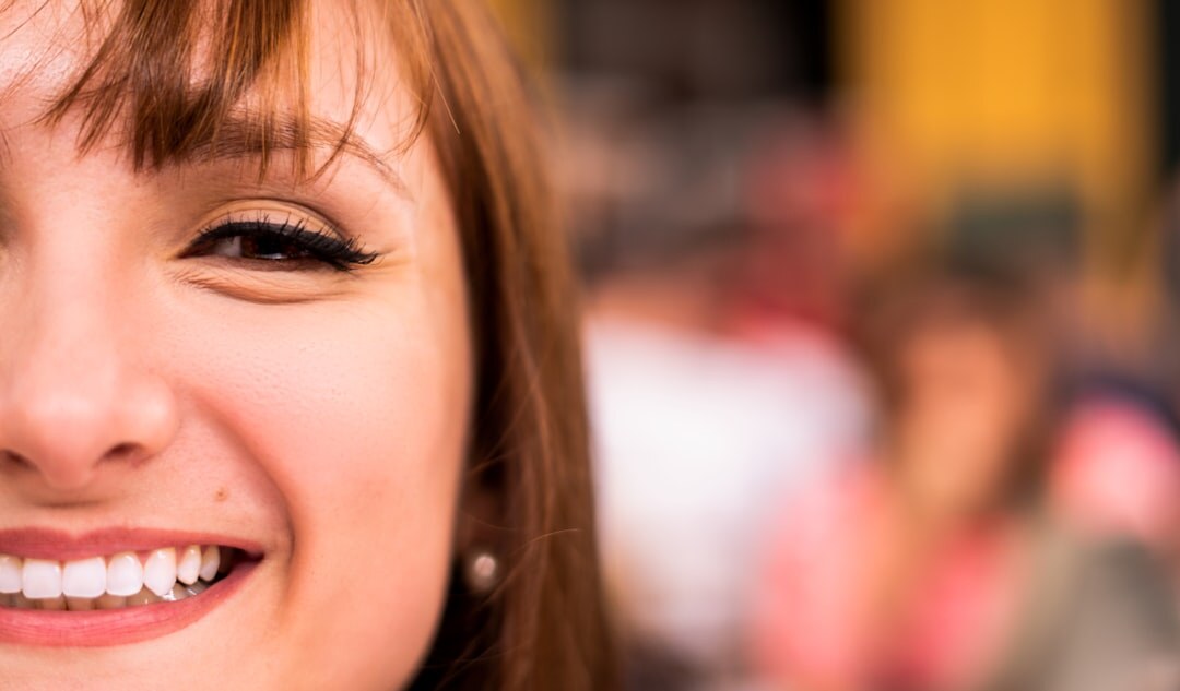 Portrait of a smiling female entertainment reporter